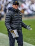 black-puffer-hooded-jacket-worn-by-american-football-coach